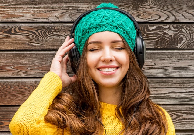 Wear a Cap or Hat with  Your Headphones to Keep Your Long Hair Looking Great